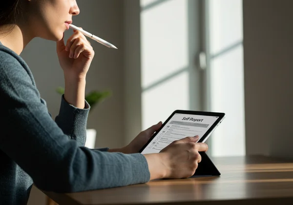 Person reflecting on a self-report emotional intelligence test